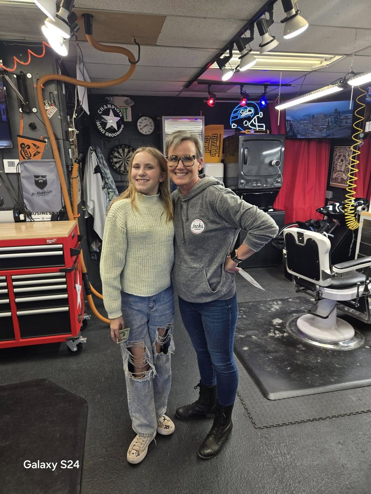 Avery with a local business that sponsored the bike drive (photo 3)
