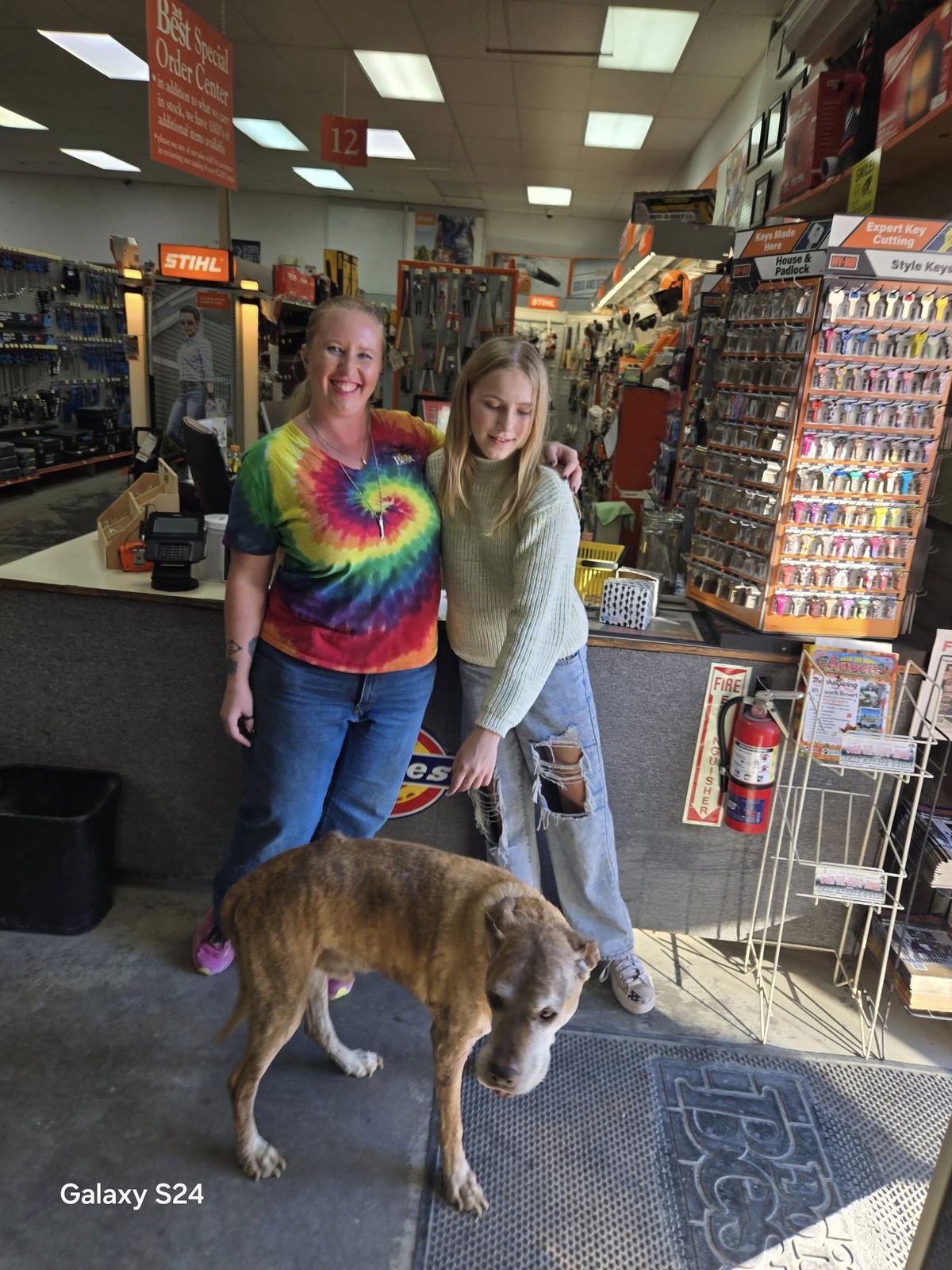 Avery with a local business that sponsored the bike drive (photo 5)